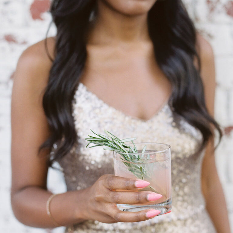 Bar_Signature-Cocktail_6_CCP (1) Wedding Guest Holding Signature Cocktail